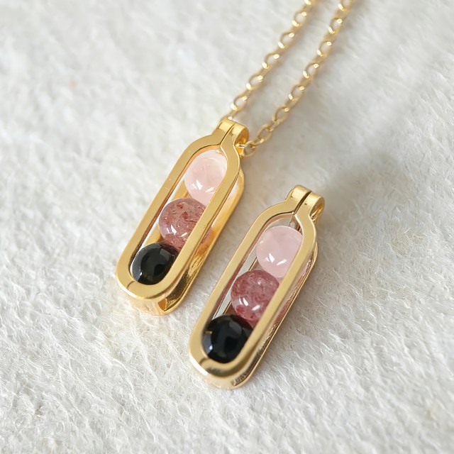 Verižica z energijskimi kristali v steklenem obesku