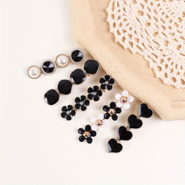 Komplet 5 lasnih sponkic v črni barvi