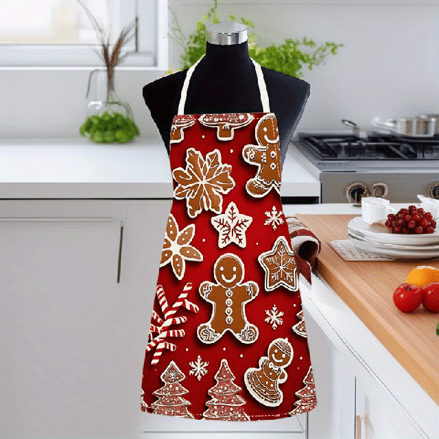 Praznični predpasnik v rdeči barvi s potiskom piškotov
