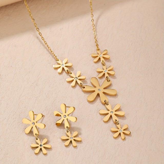 2-delni ženski komplet v zlati barvi z rožami