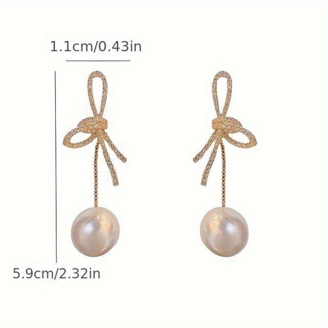 Elegantni viseči uhani s perlico in pentljo