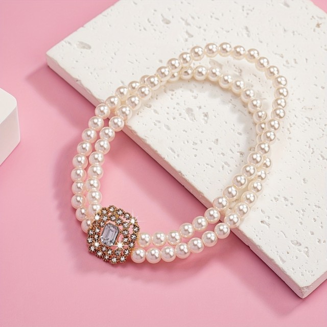 Zapestnica za nogo s perlicami in zlatim dodatkom