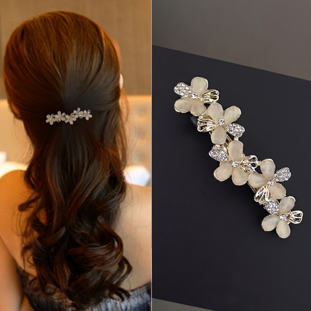 Okrasna sponka za lase s cvetličnim okrasjem