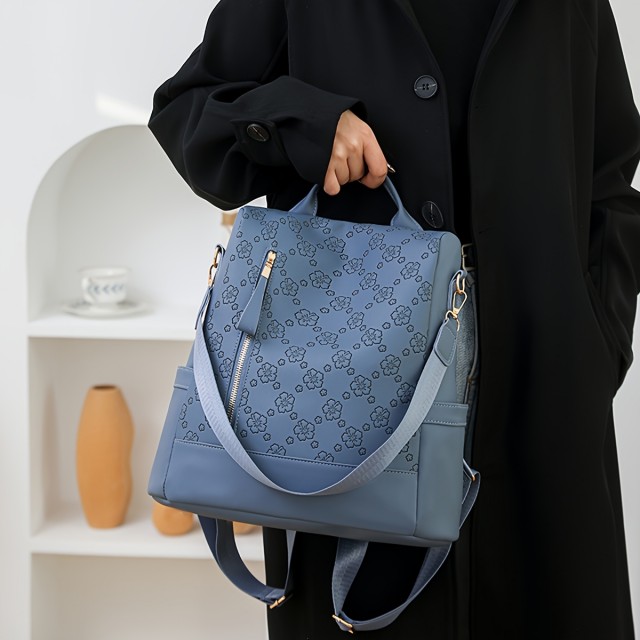 Elegantni modri cvetlični nahrbtnik z nastavljivimi trakovi 