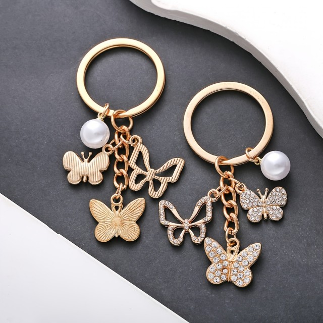 Obesek za ključe s 3 metuljčki zlate barve