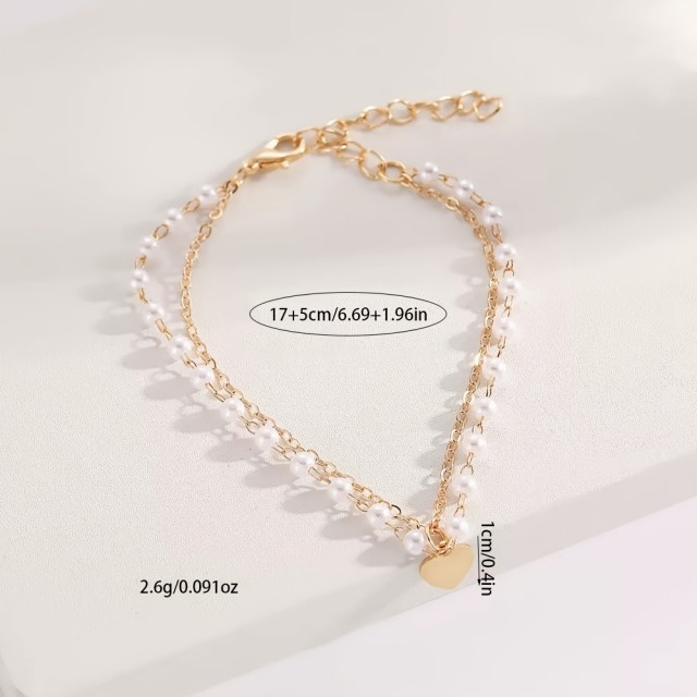 Personalizirana zapestnica s perlicami in obeskom srca 