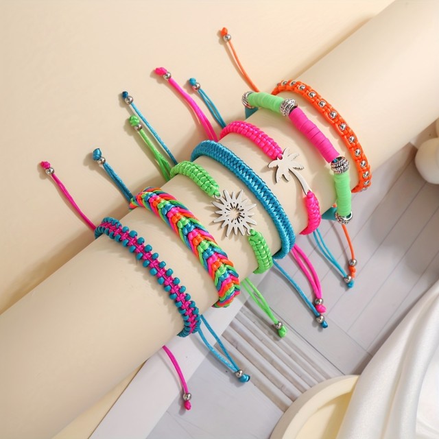 Komplet 7 poletnih pisanih zapestnic s palmo