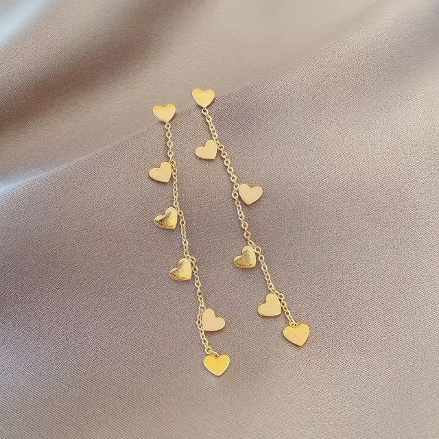 Viseči uhani s srčki zlate barve