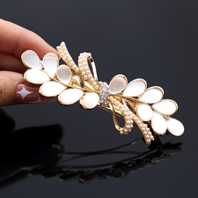 Elegantna sponka za lase v belo zlati kombinaciji