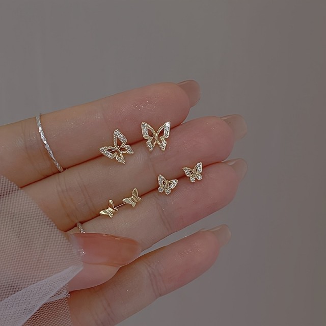 3 pari majhnih elegantnih uhanov v obliki metuljev