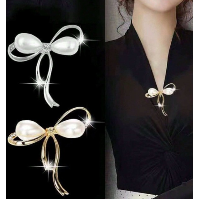 Elegantna broška zlate ali srebrne barve s pentljico