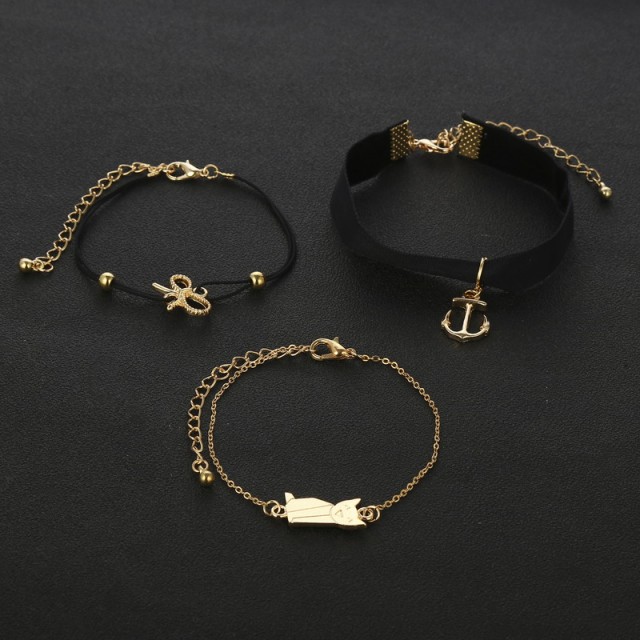 Set 3 zlatih zapestnic z muco in sidrom 