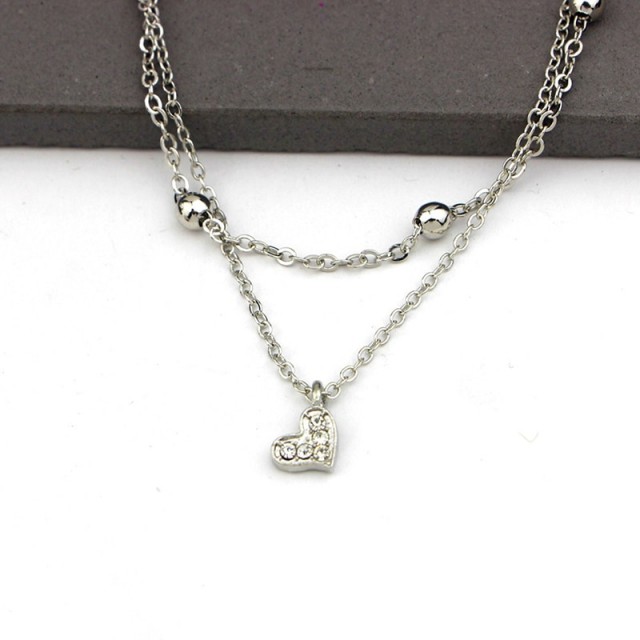 Zapestnica dvojna srček, srebrne barve