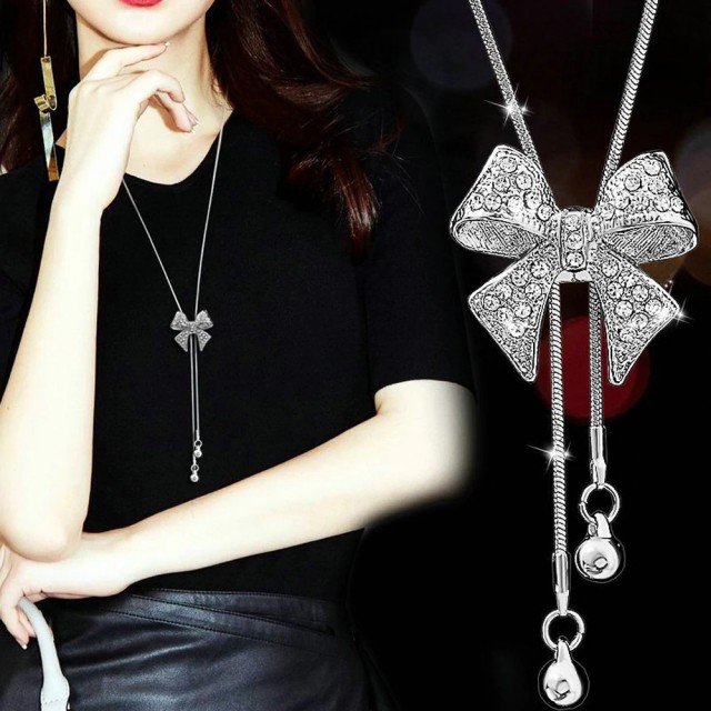 Verižica srebrna daljša, s pentljico