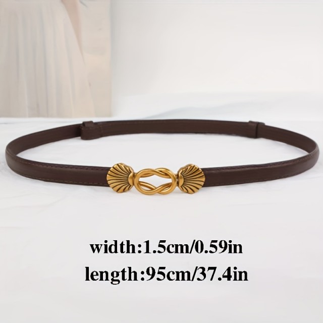 Eleganten ženski pas z zlato zaponko školjke