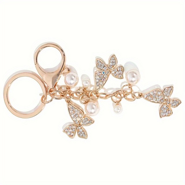 Obesek za ključe z metuljčki in perlicami