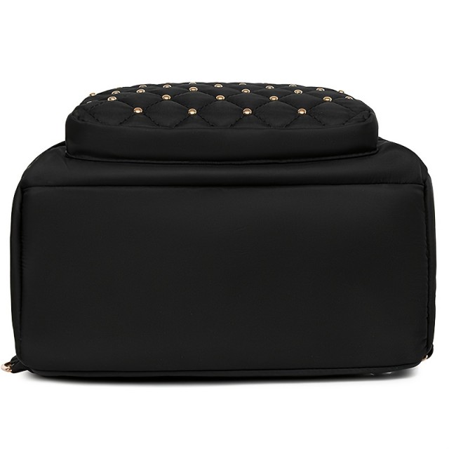 Eleganten črn nahrbtnik z zlatimi detajli