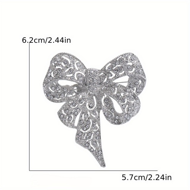 Elegantna broška s pentljo 