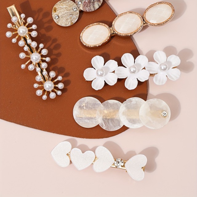 Komplet 6 lasnih sponkic v beli barvi