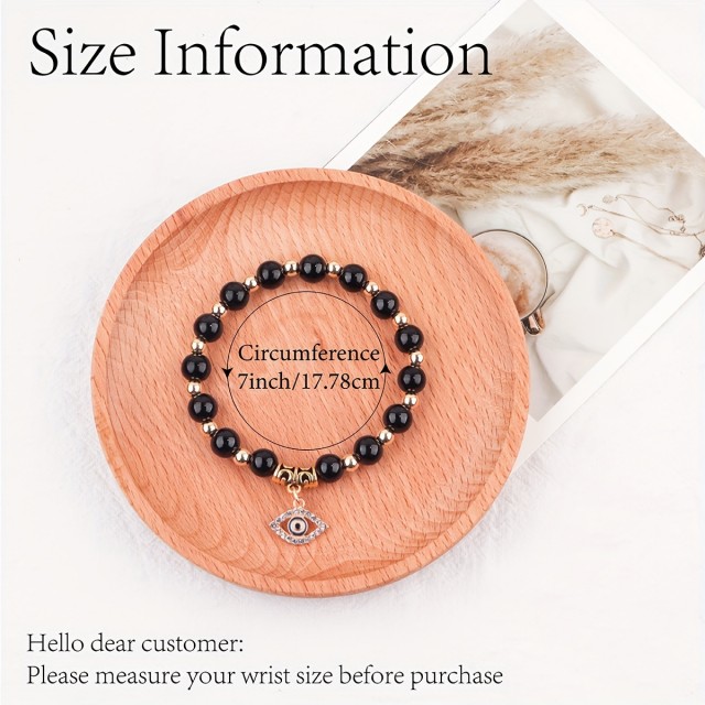 Zaščitna zapestnica z obeskom 