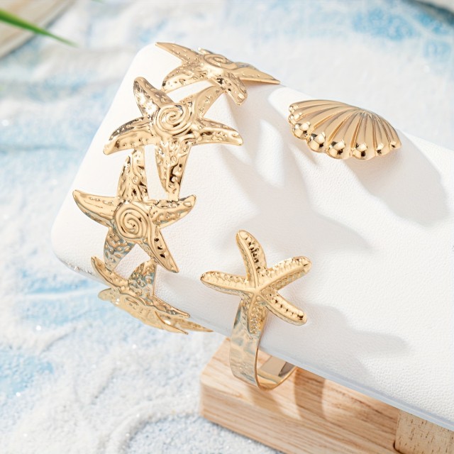 Komplet 2 zlatih nastavljivih zapestnic z morskim motivom