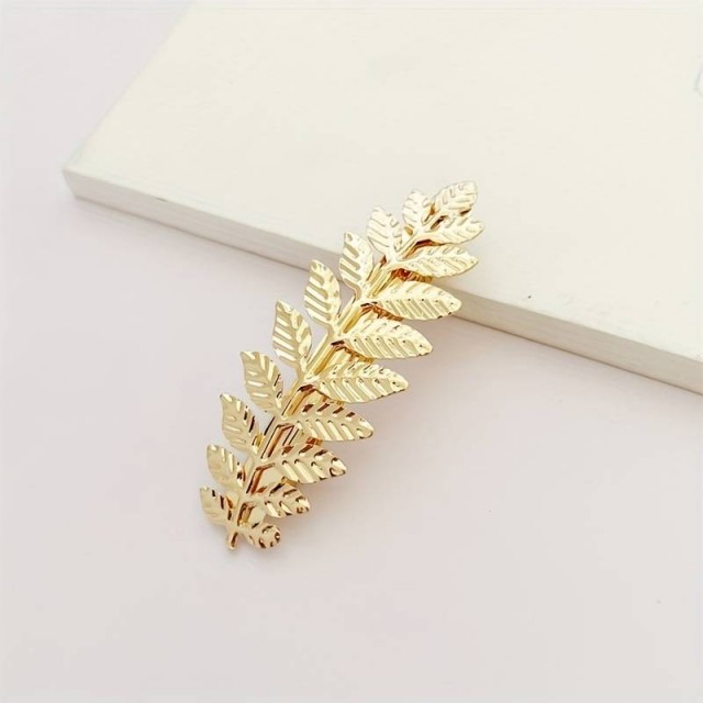 Špangica za lase zlate barve, vejica z listi