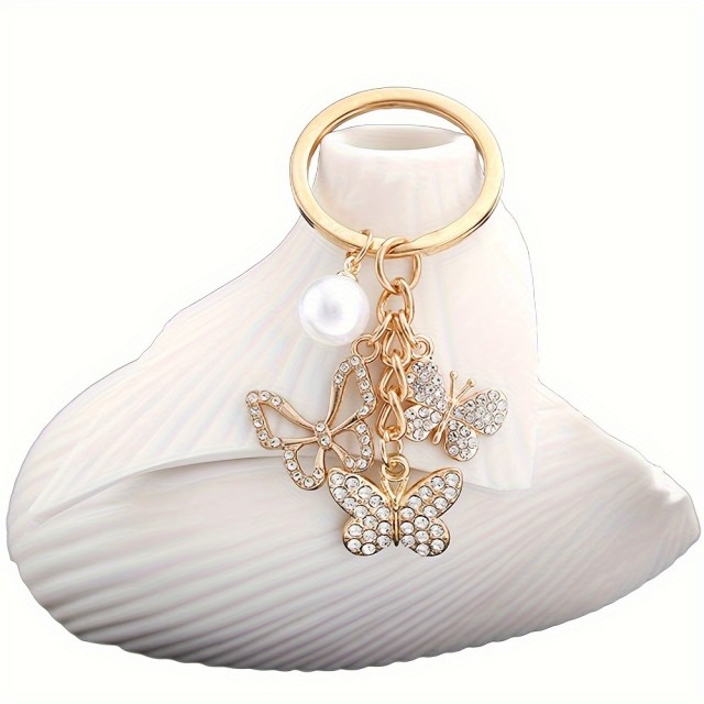 Obesek za ključe s 3 metuljčki zlate barve