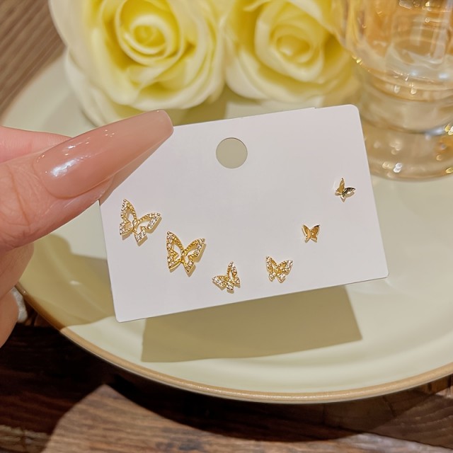 3 pari majhnih elegantnih uhanov v obliki metuljev