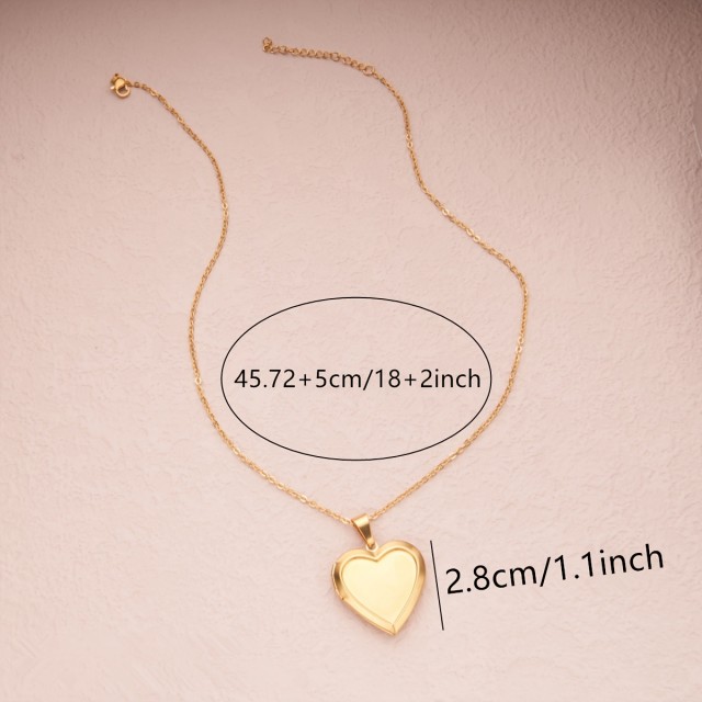 Nerjaveča ogrlica z odpirajočim medaljonom v obliki srca 2 barvi