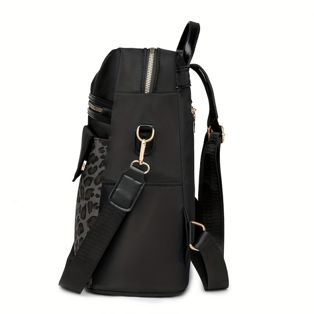 Elegantni nahrbtnik z leopardjim vzorcem in več žepi