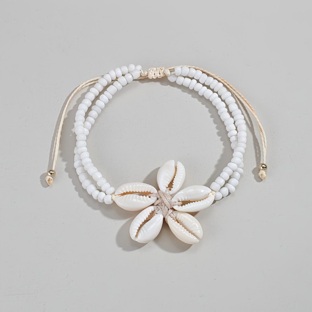 Čudovita zapestnica za nogo s školjkastim cvetom