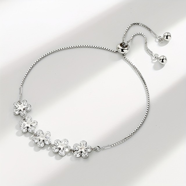 Elegantna zapestnica v zlati ali srebrni barvi z rožicami