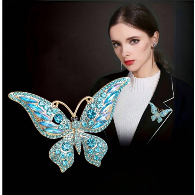 Elegantna broška z modrim metuljem 