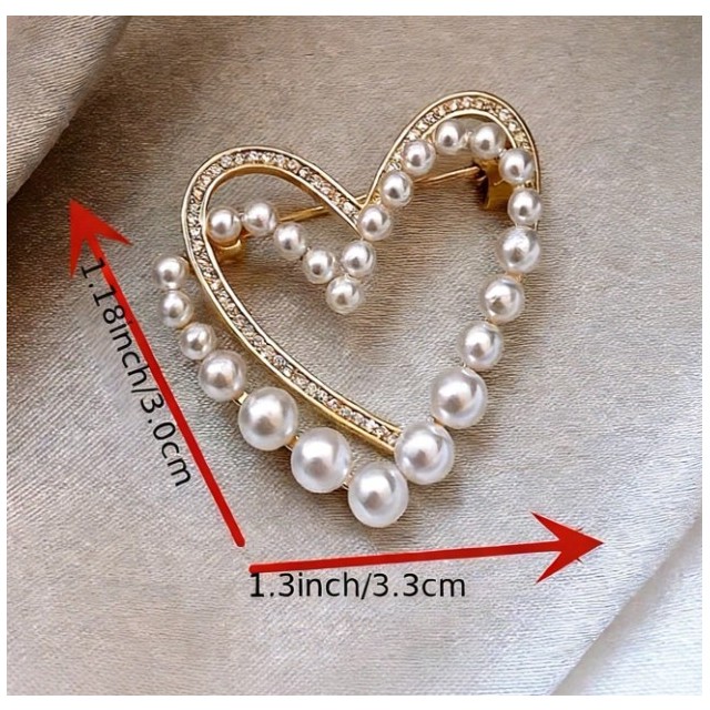 Elegantna broška v obliki srca zlate barve