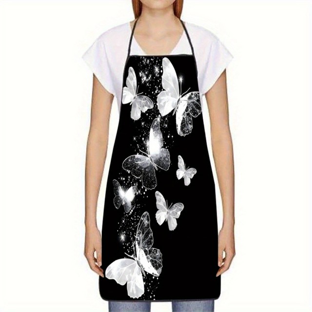 Ženski predpasnik s potiskom metulja na črnem ozadju