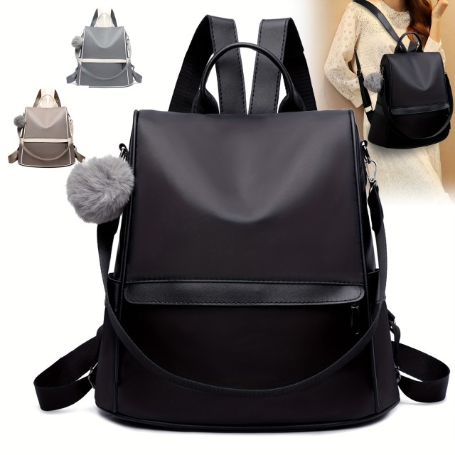 Ženski nahrbtnik z nastavljivimi jermeni in pomponom