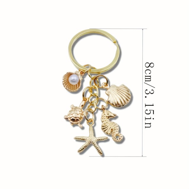 Zlat obesek za ključe z morskim motivom