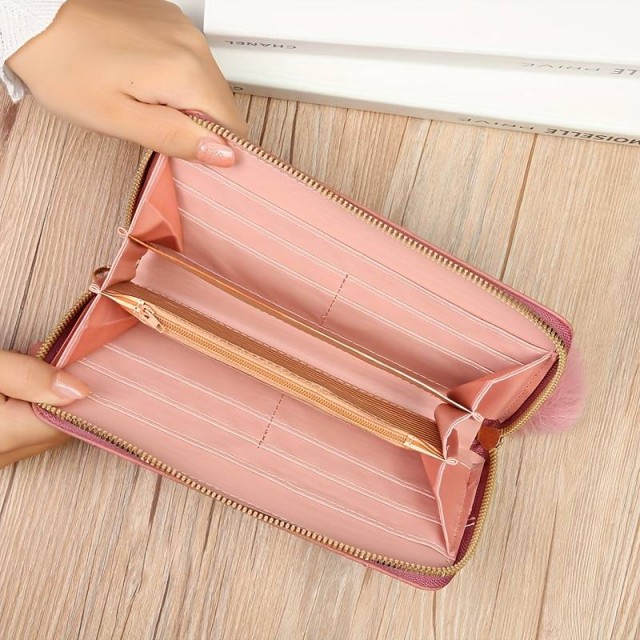 Modna ženska denarnica v roza barvi s pentljico