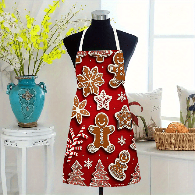 Praznični predpasnik v rdeči barvi s potiskom piškotov