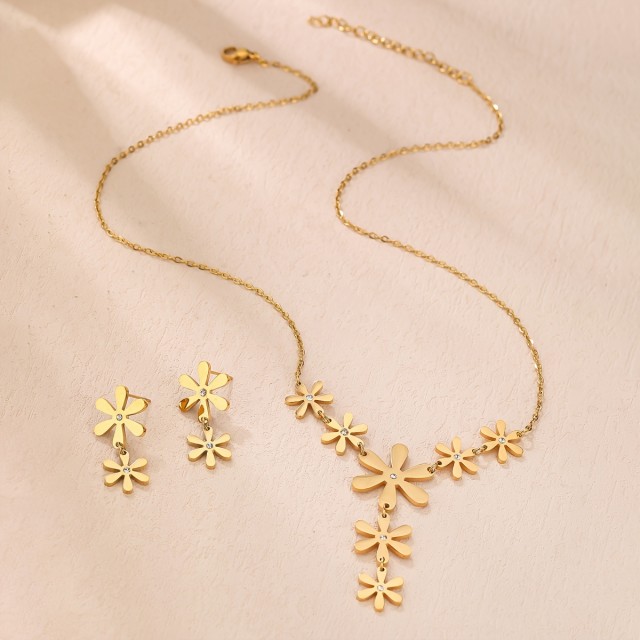 2-delni ženski komplet v zlati barvi z rožami