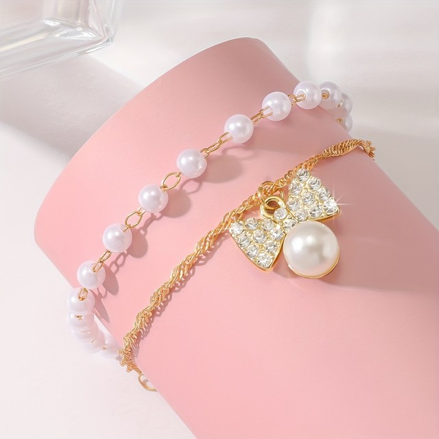 Elegantna zapestnica za nogo s perlicami in pentljo