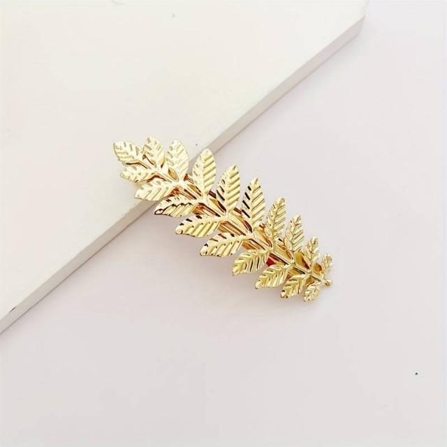 Špangica za lase zlate barve, vejica z listi