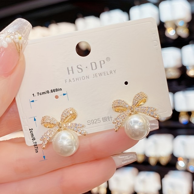 Praznični uhani s pentljo in perlico