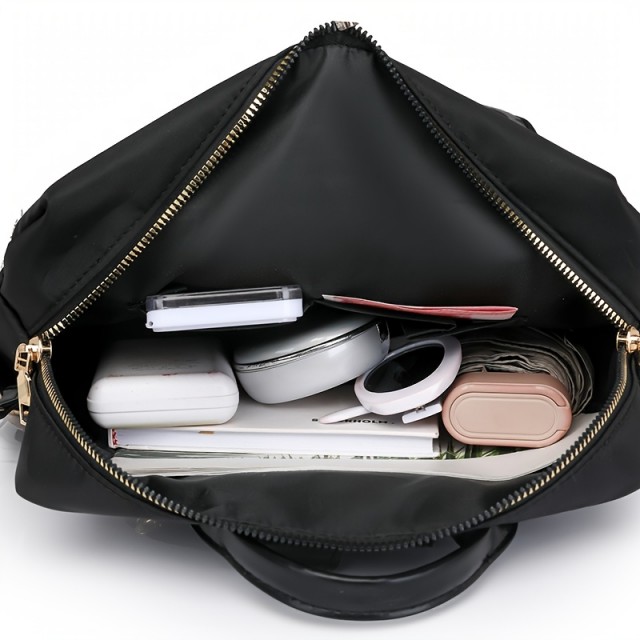 Elegantni nahrbtnik z leopardjim vzorcem in več žepi