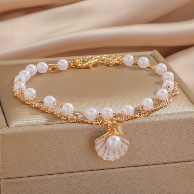 Dvodelna zapestnica za nogo s školjko in perlicami