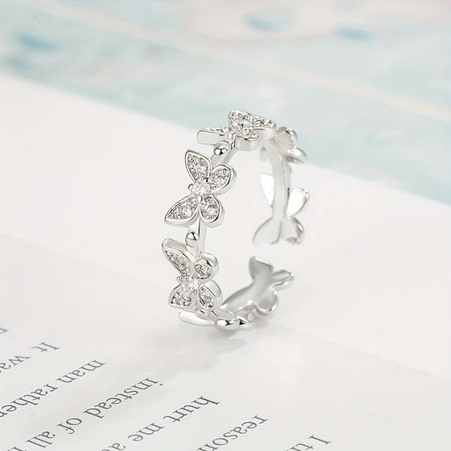 Odprt nastavljiv prstan z metulji v srebrni barvi