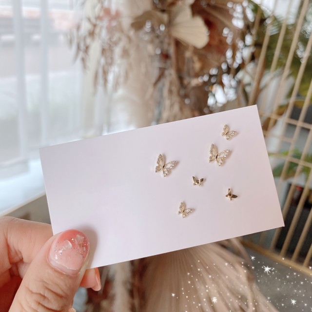 3 pari majhnih elegantnih uhanov v obliki metuljev