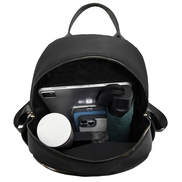 Eleganten črn nahrbtnik z zlatimi detajli