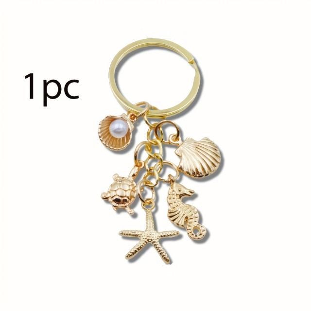Zlat obesek za ključe z morskim motivom