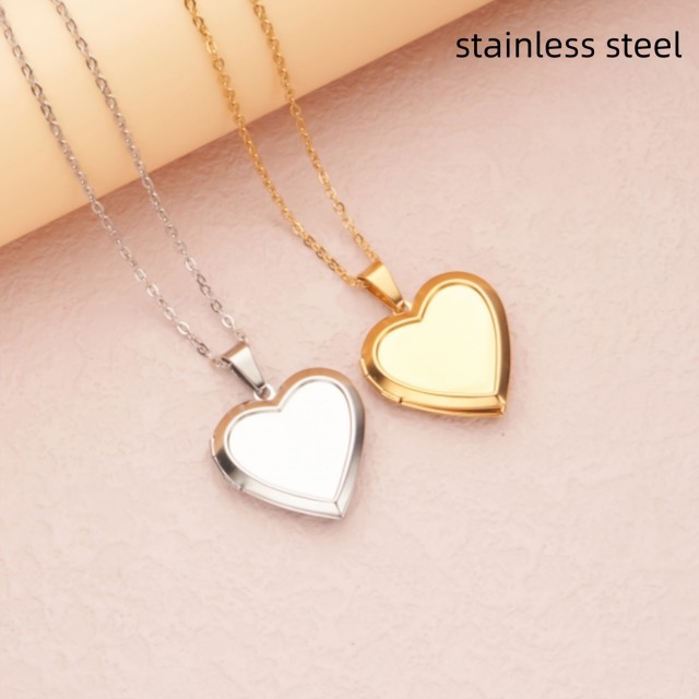 Nerjaveča ogrlica z odpirajočim medaljonom v obliki srca 2 barvi